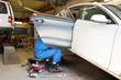 Photo: The car door is being changed in repair service The car door is being changed in repair service
