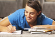 Young man working on school