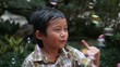 Video: Asian Kid plays with bubbles Asian Kid plays with bubbles