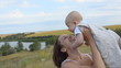 Video: mother kissing her baby boy at outdoors mother kissing her baby boy at outdoors