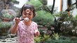 Video: Cute little girl having fun with bubbles Cute little girl having fun with bubbles