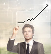 Illustration: Businessman drawing a graph -growth Businessman drawing a graph -growth