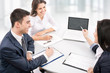 Photo: Business team working on their business project Business team working on their business project