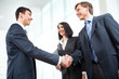 Photo: Business people shaking hands Business people shaking hands