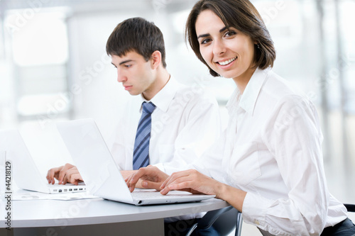 Foto: Business people working on their business project Business people working on their business project