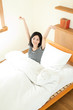 Beautiful young woman relaxing in the room