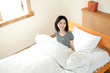 Beautiful young woman relaxing in the room