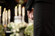 woman at funeral mourning
