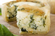 Quiche - Individual goat's cheese and spinach quiche.