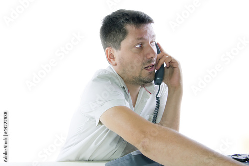 Photo: Businessman speaking on the phone Businessman speaking on the phone