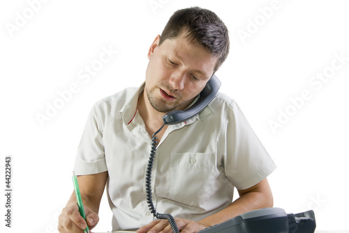 Photo: Businessman speaking on the phone Businessman speaking on the phone