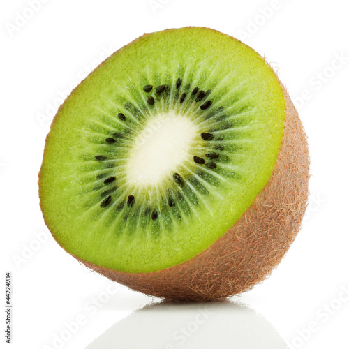 Photo: Half of juicy kiwi fruit on white Half of juicy kiwi fruit on white