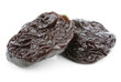 Dried plum fruits - prunes on white
