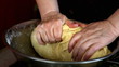 Woman kneading a delicious sponge cake for her family