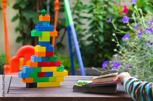 Photo: Children toys in garden Children toys in garden