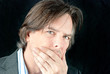 Ill Businessman Covers Mouth