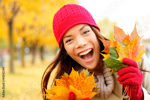 Photo: Excited happy fall woman Excited happy fall woman