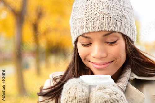 Photo: Fall woman drinking coffee Fall woman drinking coffee