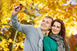 Couple at autumn outdoors