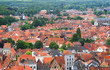 Photo: Roofs of Flemish Houses and windmill in Brugge, Belgium Roofs of Flemish Houses and windmill in Brugge, Belgium