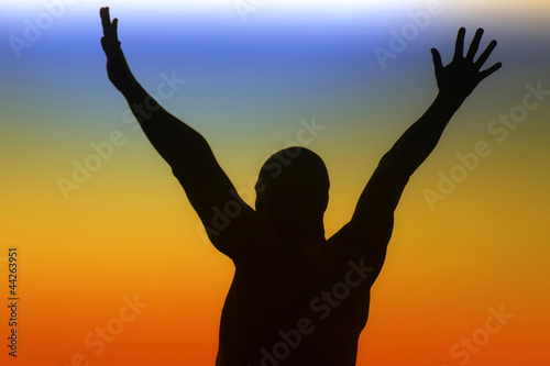 Illustration: Silhouette of a man on a rainbow background Silhouette of a man on a rainbow background