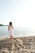 child look the sea on the hill
