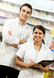 Two Pharmacy chemist in drugstore