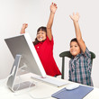 Photo: Children at Computer Raising Hands in Class Children at Computer Raising Hands in Class