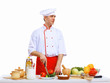 Young cook preparing food