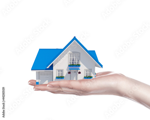 Photo: The house in human hands The house in human hands