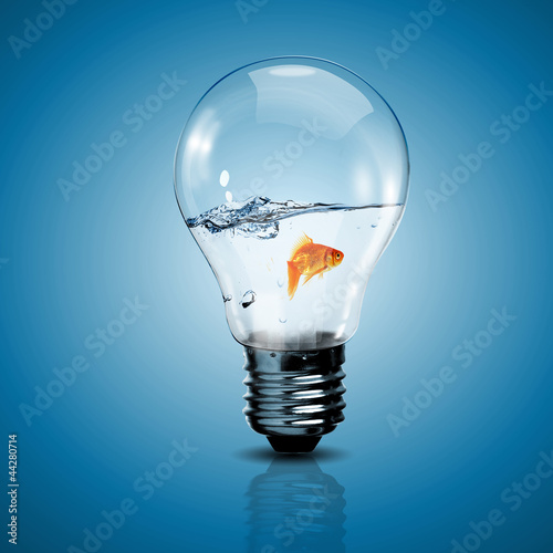 Photo: Electric light bulb and a plant inside it Electric light bulb and a plant inside it