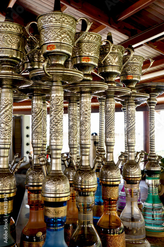 Photo: Rows of colorful and decorated waterpipes Rows of colorful and decorated waterpipes
