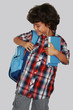 A beautiful schoolboy with blue bag, isolated on grey background