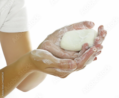 Photo: hands and soap on white background hands and soap on white background