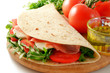 Foto: Piadina with rocket salad, raw ham, mozzarella and tomato Piadina with rocket salad, raw ham, mozzarella and tomato