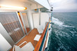 Foto: balcony with chairs table lamp on ship with view on sea balcony with chairs table lamp on ship with view on sea