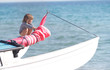 young happy child on board of sea yacht