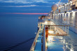Foto: Deck of multidecked ship in evening light. Deck of multidecked ship in evening light.