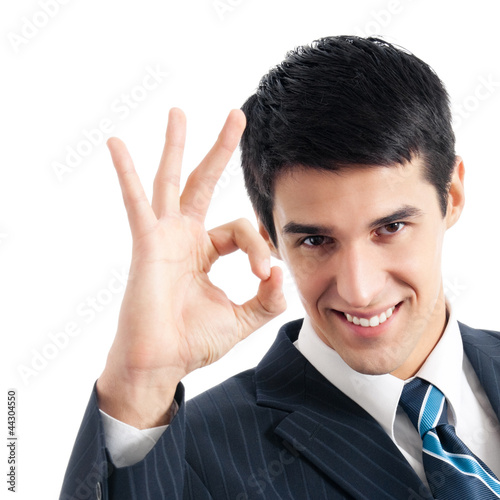 Photo: Businessman with okay gesture, isolated Businessman with okay gesture, isolated