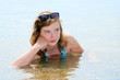 Young girl bathing at hot summer day.