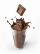 Chocolate blocks falling into a glass splashing.