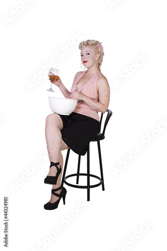 Photo: Sexy Retro Woman Cooking while Drinking Sexy Retro Woman Cooking while Drinking