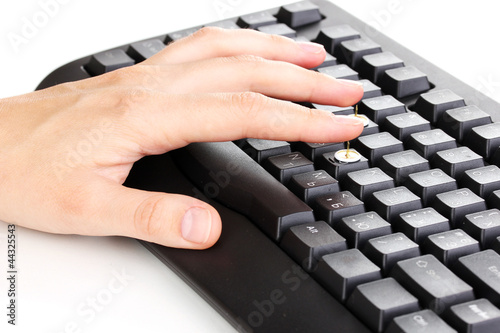Photo: Painful typing on keyboard close-up Painful typing on keyboard close-up
