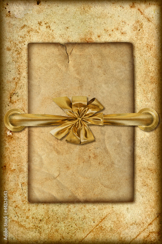 Photo: grungy card with golden ribbon grungy card with golden ribbon