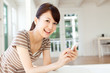 Photo: Beautiful young woman relaxing in the room Beautiful young woman relaxing in the room