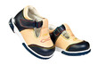 Pair of babies shoes from natural leather.