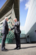 Two senior businessmen shaking-hands