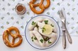 Munich white sausages with sweet mustard and pretzel