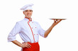 Cook holding an empty tray