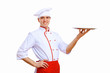 Cook holding an empty tray